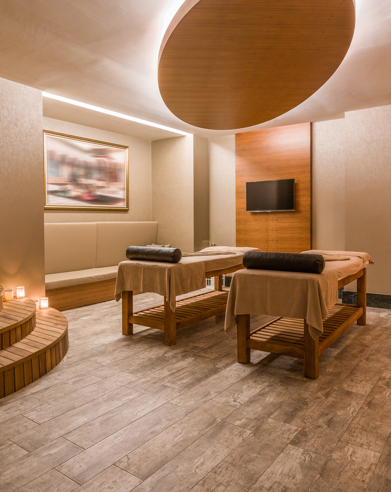 Serene massage room with warm lighting