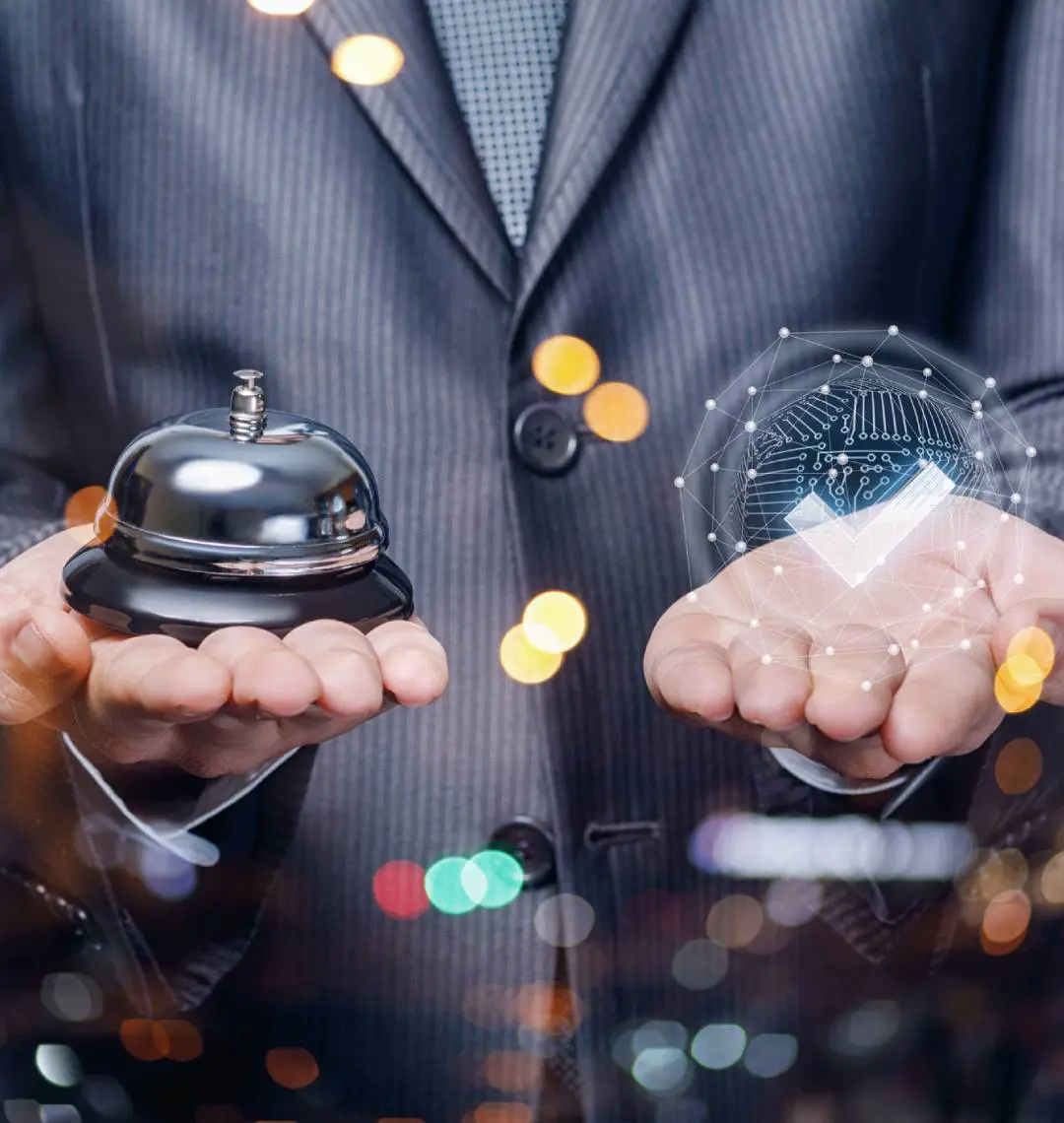 Person holding service bell and digital checkmark