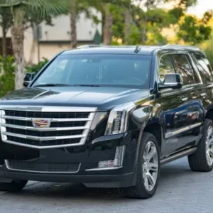 Black Cadillac Escalade SUV parked outdoors